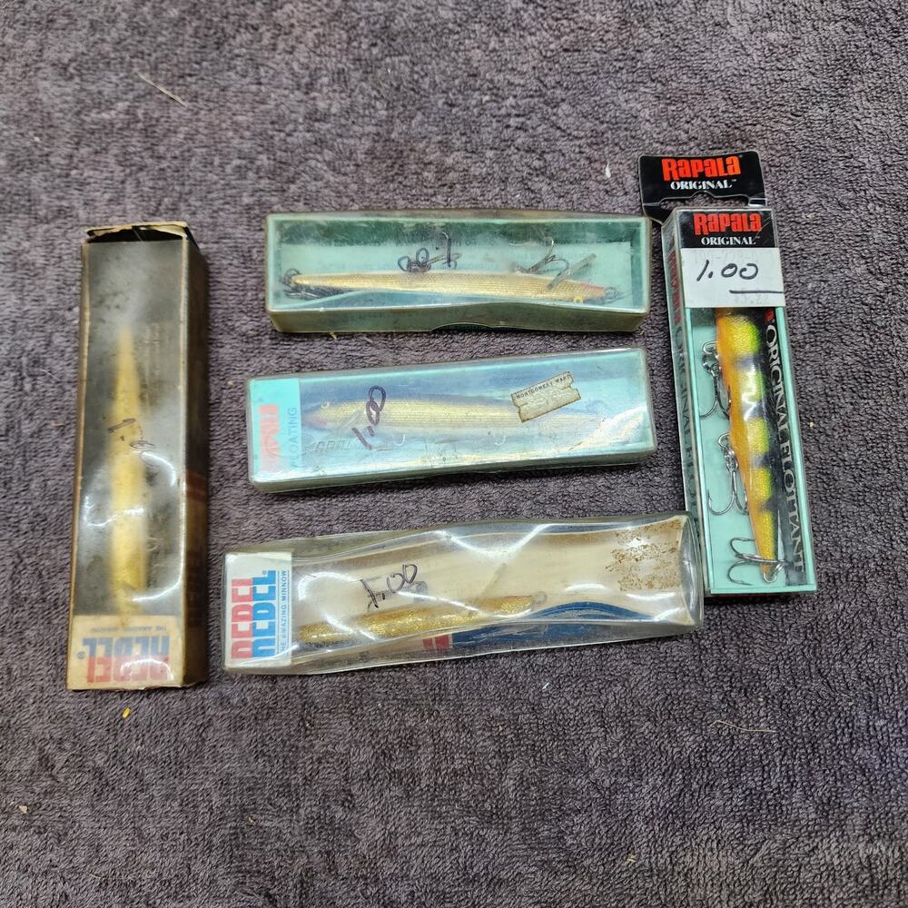 Lot of vintage fishing lures in boxes Rebel and Rapala b50